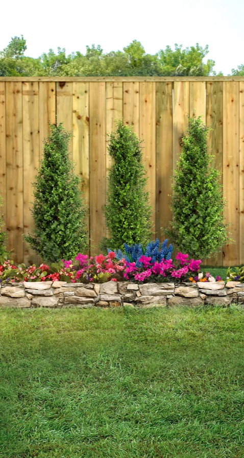 bed with trees and flowers for residential customer